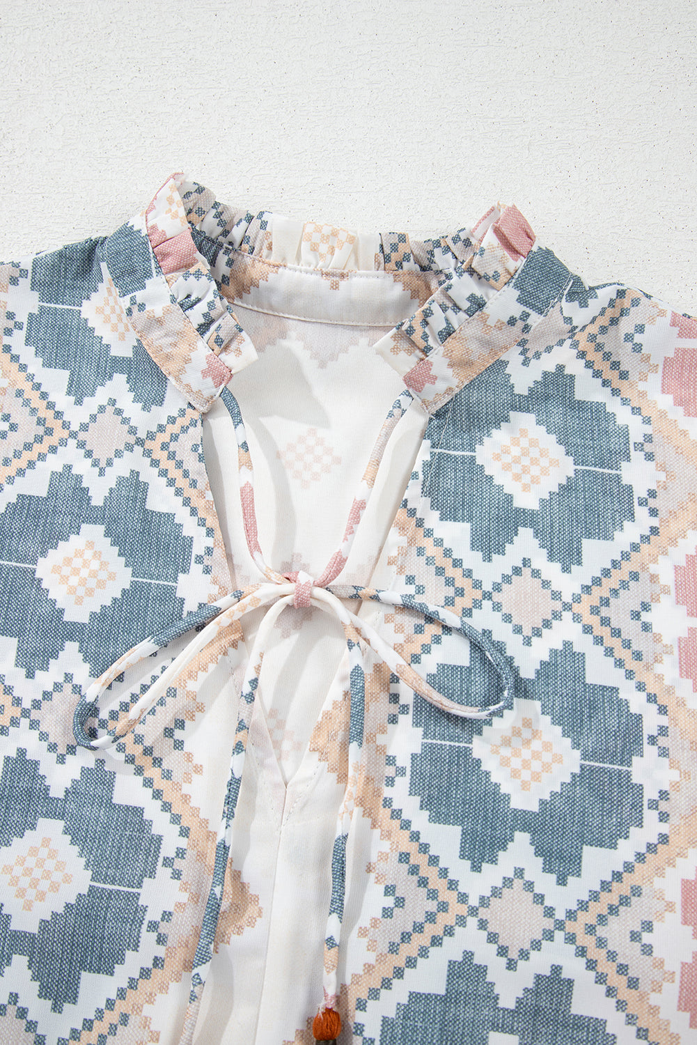 Geometric Tassel Tie V-Neck Blouse