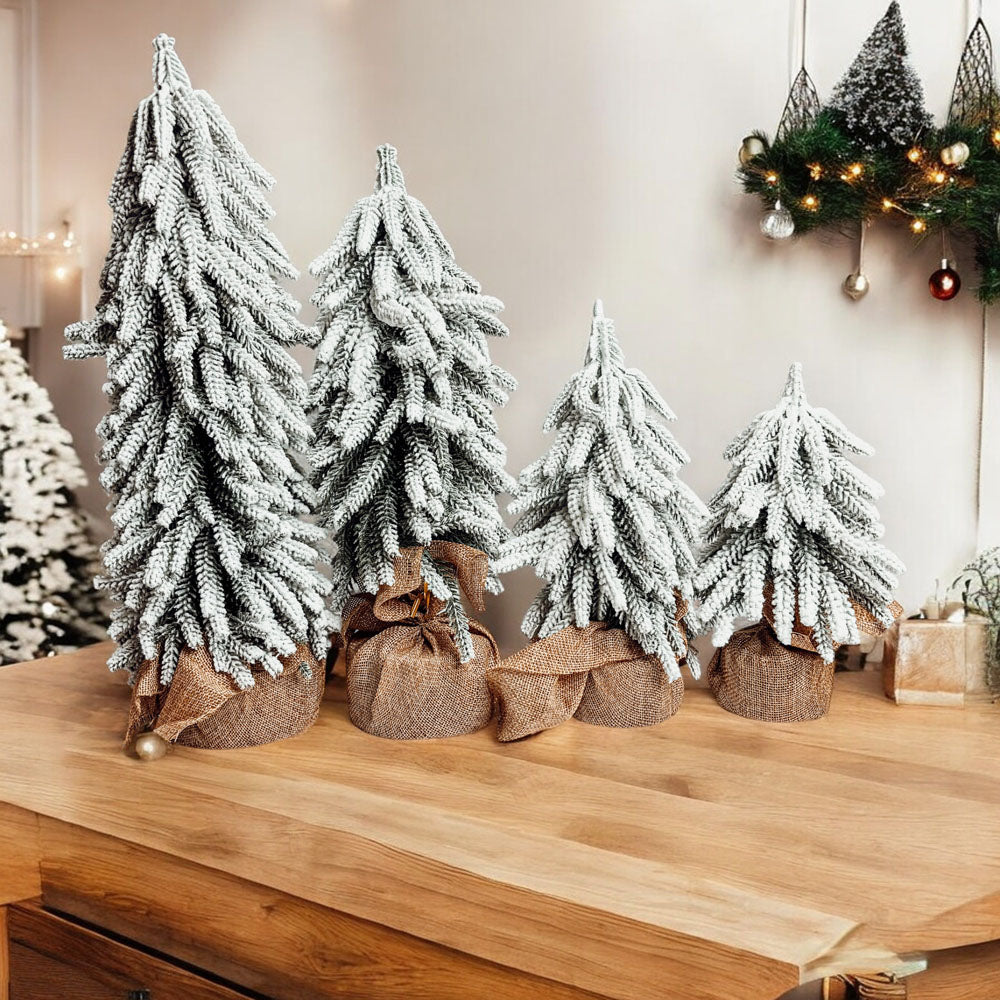 snowy tree branch
snow capped christmas tree
small christmas tree table decorations
snow covered christmas tree decoration ideas