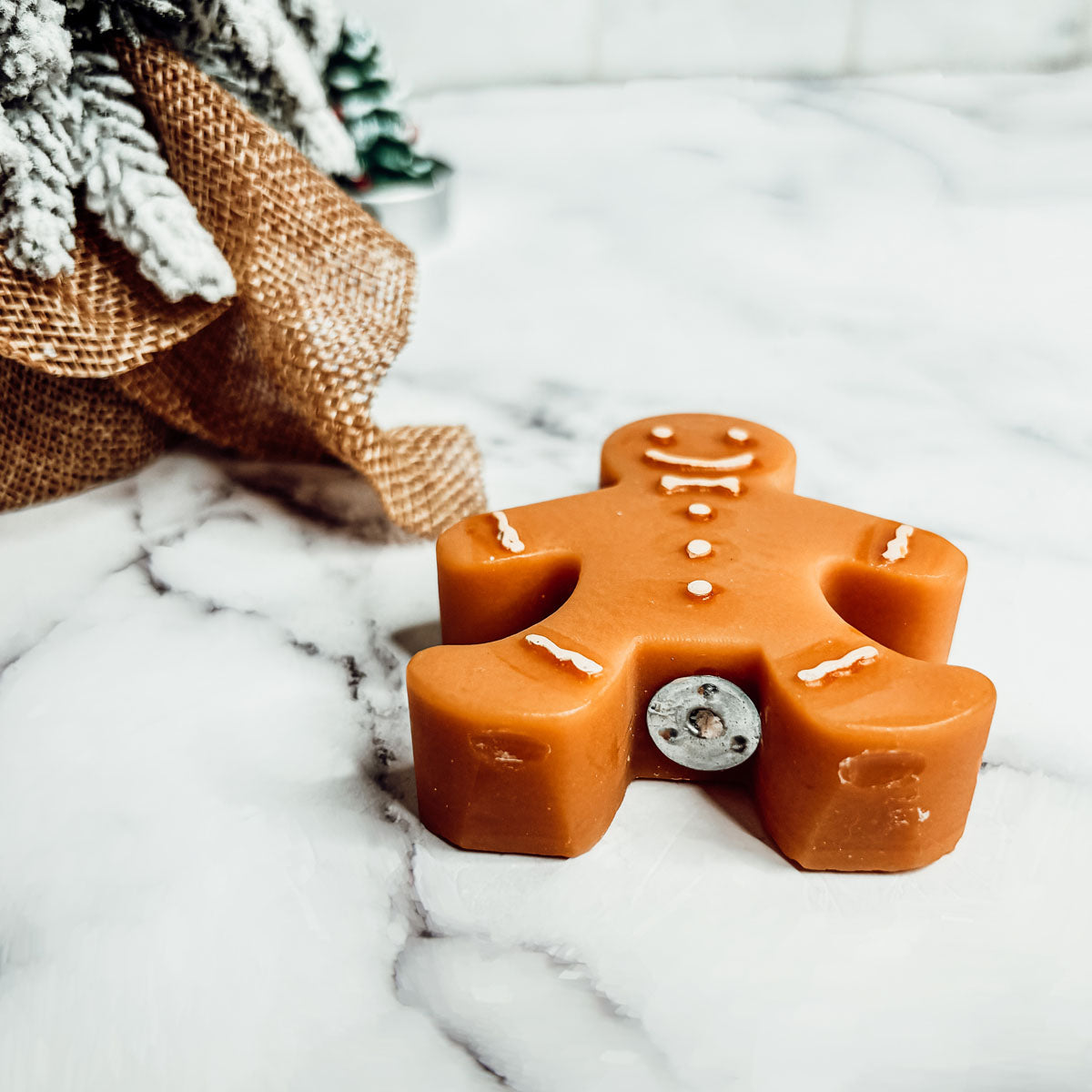 flameless gingerbread shaped candles
Gingerbread votive candle
Gingerbread shaped candles