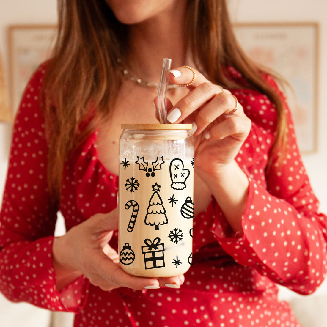 Glass cups with christmas graphics on it